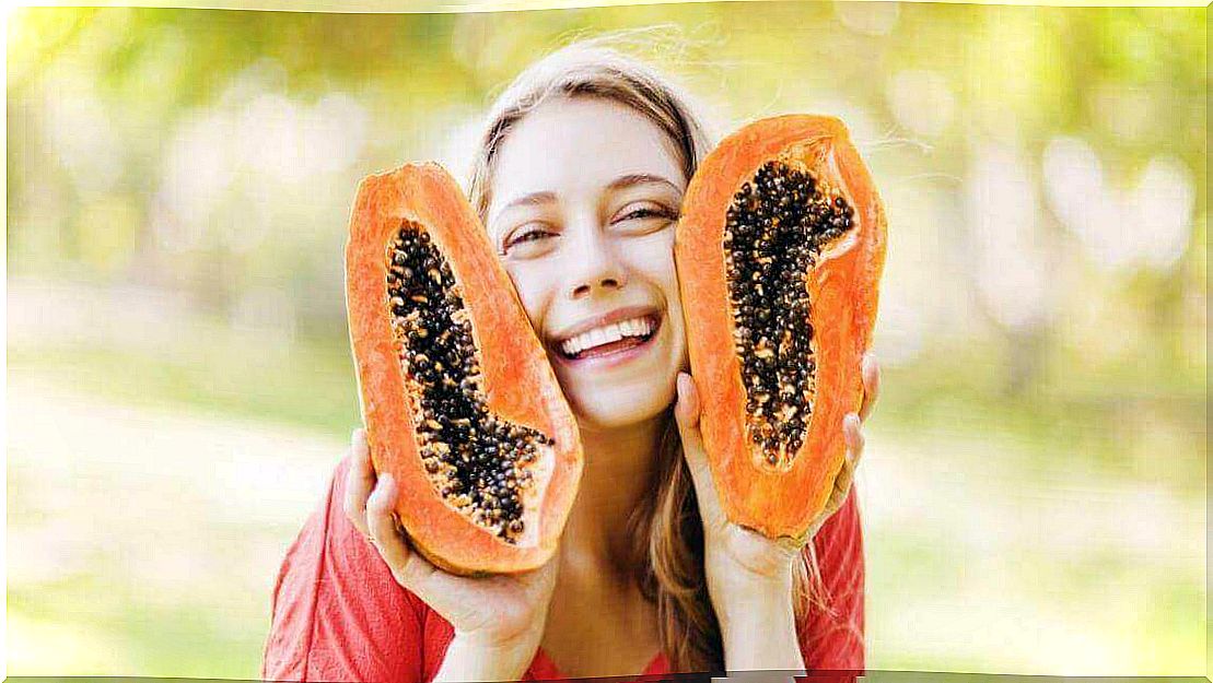 happy woman and papaya