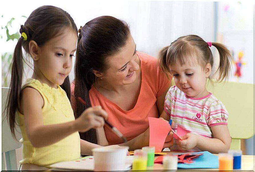 mother fiddling with her children