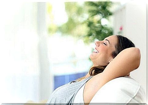 smiling woman on the couch