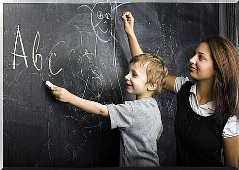 teacher and student on blackboard